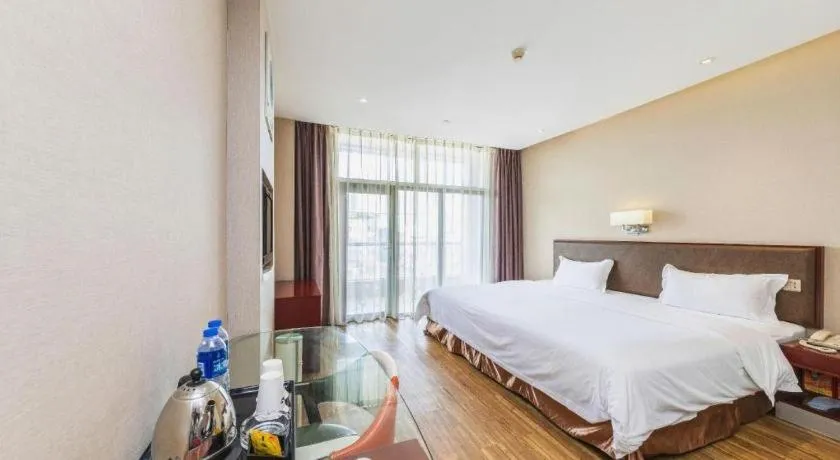 Bed in PAI Hotel Guangzhou North Gate of Chimelong Zoo