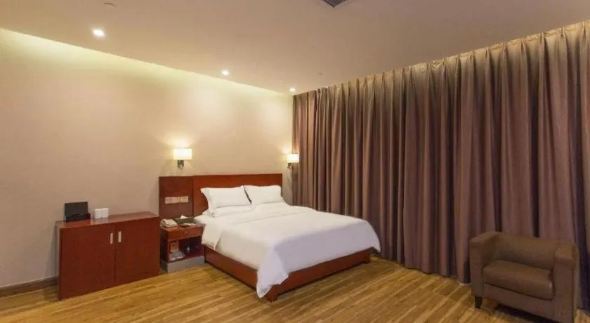 Bed in PAI Hotel Guangzhou North Gate of Chimelong Zoo