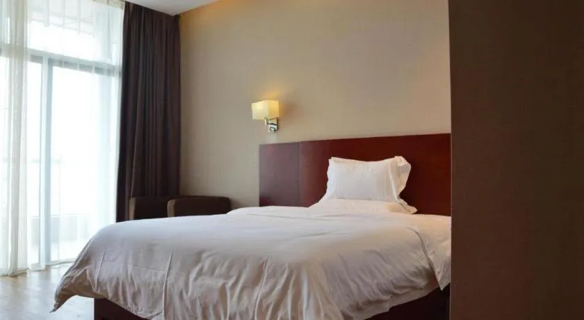 Bed in PAI Hotel Guangzhou North Gate of Chimelong Zoo