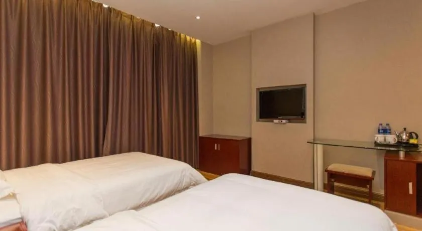 Bed in PAI Hotel Guangzhou North Gate of Chimelong Zoo