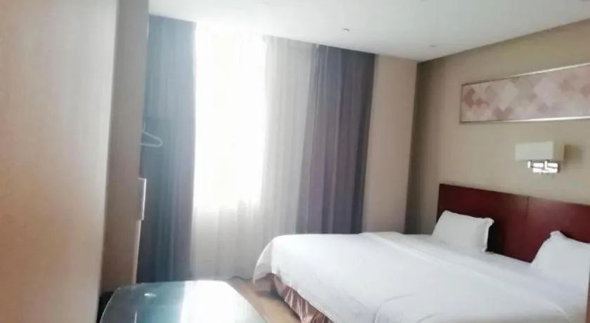 Bed in PAI Hotel Guangzhou North Gate of Chimelong Zoo