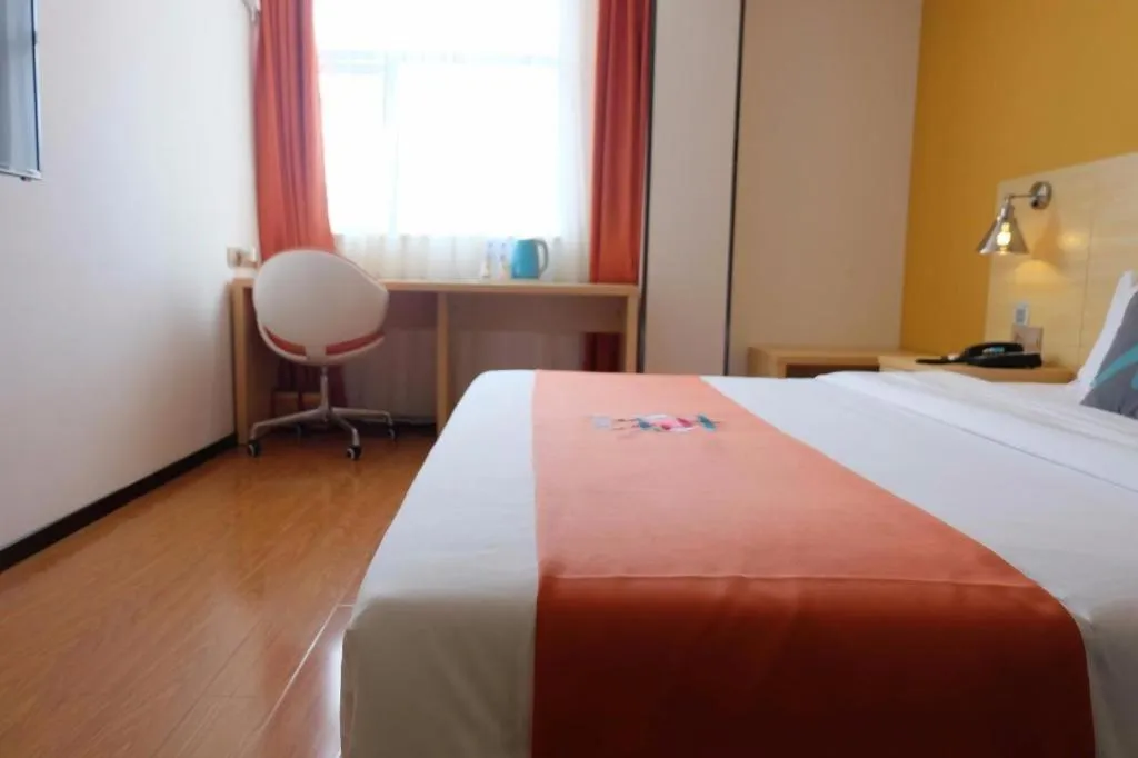 Bed in PAI Hotel Guangzhou North Gate of Chimelong Zoo