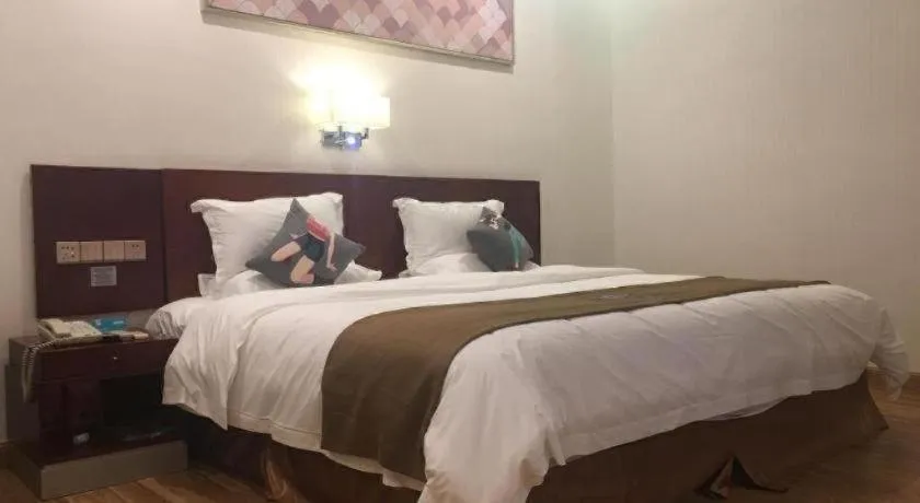 Bed in PAI Hotel Guangzhou North Gate of Chimelong Zoo