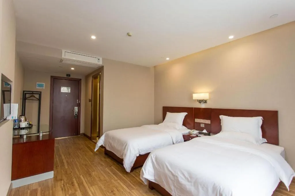 Bed in PAI Hotel Guangzhou North Gate of Chimelong Zoo