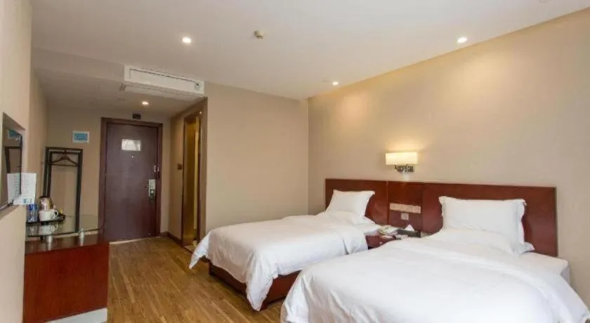 Bed in PAI Hotel Guangzhou North Gate of Chimelong Zoo