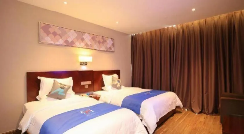 Bed in PAI Hotel Guangzhou North Gate of Chimelong Zoo