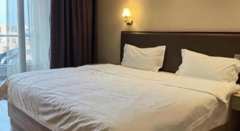 Bed in PAI Hotel Guangzhou North Gate of Chimelong Zoo