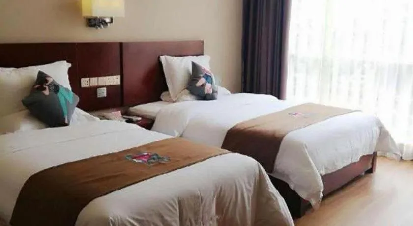 Bed in PAI Hotel Guangzhou North Gate of Chimelong Zoo