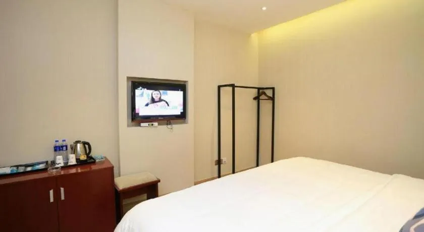 Bed in PAI Hotel Guangzhou North Gate of Chimelong Zoo