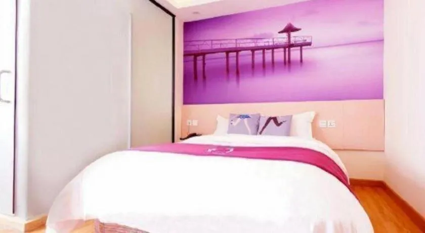 Bed in PAI Hotel Guangzhou North Gate of Chimelong Zoo