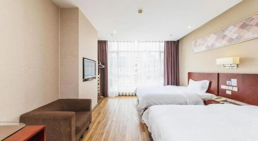 Bed in PAI Hotel Guangzhou North Gate of Chimelong Zoo