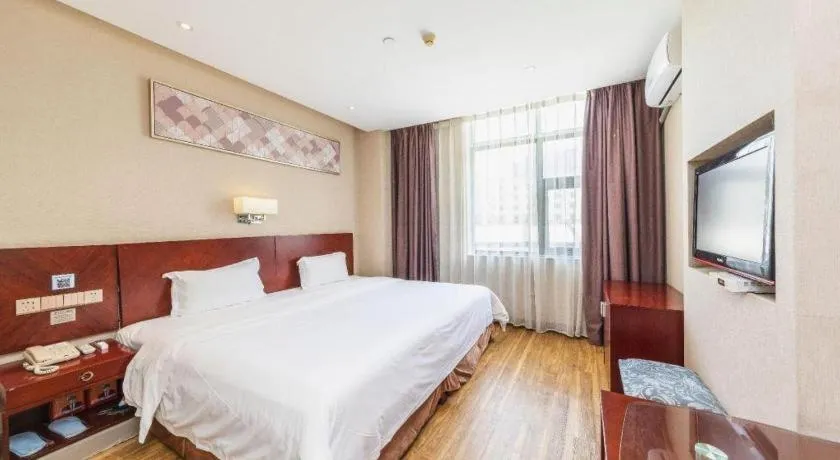 Bed in PAI Hotel Guangzhou North Gate of Chimelong Zoo