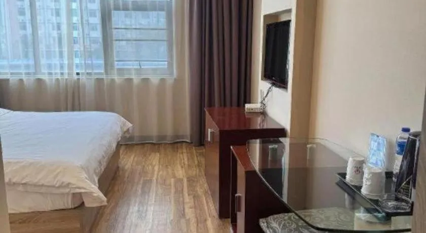 Bed in PAI Hotel Guangzhou North Gate of Chimelong Zoo