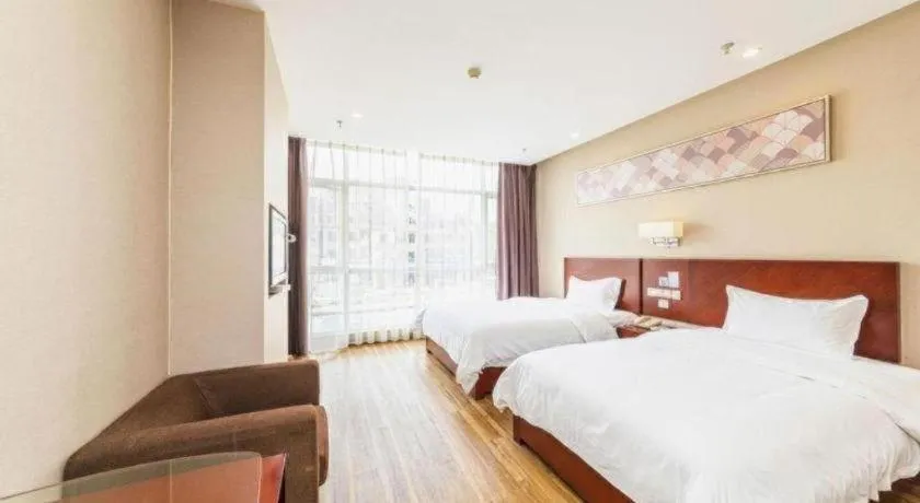 Bed in PAI Hotel Guangzhou North Gate of Chimelong Zoo