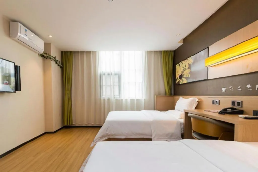 Bed in IU Hotels Guangzhou Panyu Dashi Chimelong Safari Park