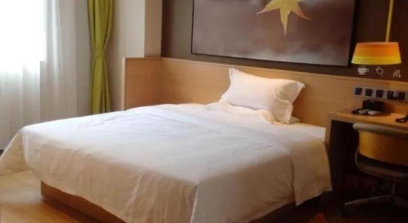 Bed in IU Hotels Guangzhou Panyu Dashi Chimelong Safari Park