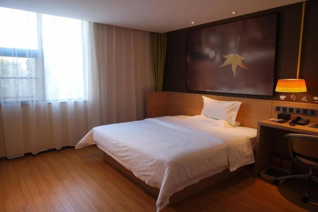 Bed in IU Hotels Guangzhou Panyu Dashi Chimelong Safari Park