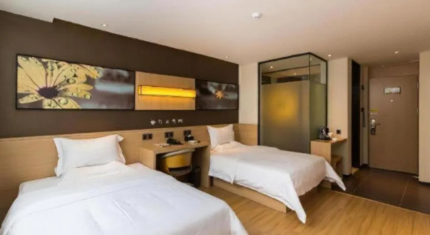 Bed in IU Hotels Guangzhou Panyu Dashi Chimelong Safari Park