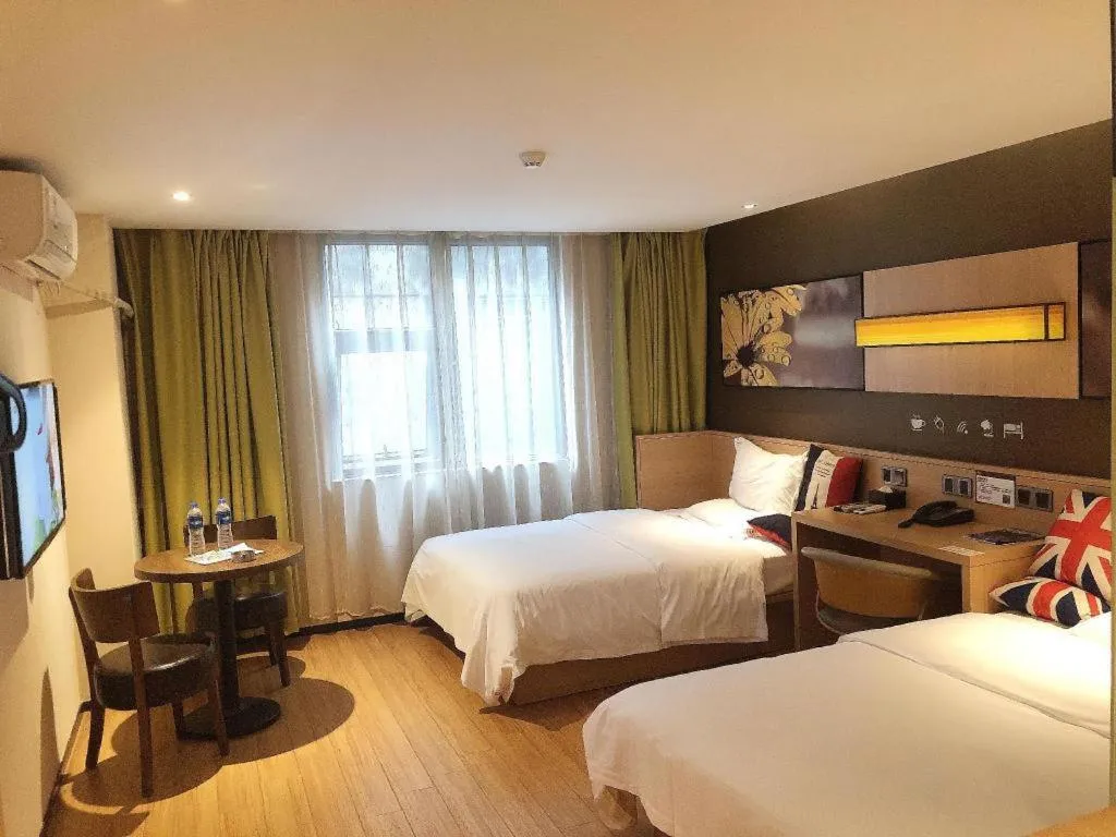 Bed in IU Hotels Guangzhou Panyu Dashi Chimelong Safari Park