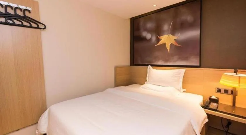 Bed in IU Hotels Guangzhou Panyu Dashi Chimelong Safari Park