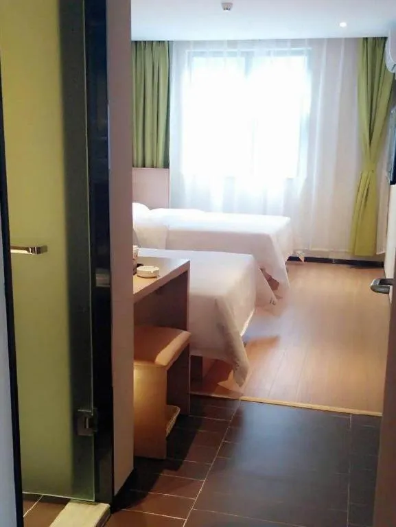 Bed in IU Hotels Guangzhou Panyu Dashi Chimelong Safari Park