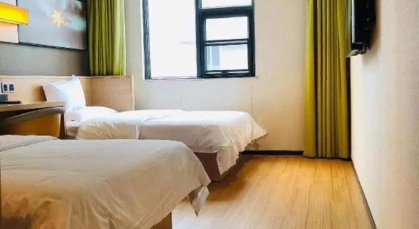 Bed in IU Hotels Guangzhou Panyu Dashi Chimelong Safari Park