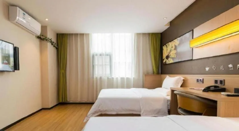 Bed in IU Hotels Guangzhou Panyu Dashi Chimelong Safari Park