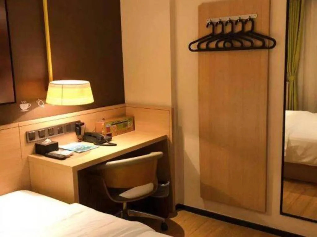 Bed in IU Hotels Guangzhou Panyu Dashi Chimelong Safari Park