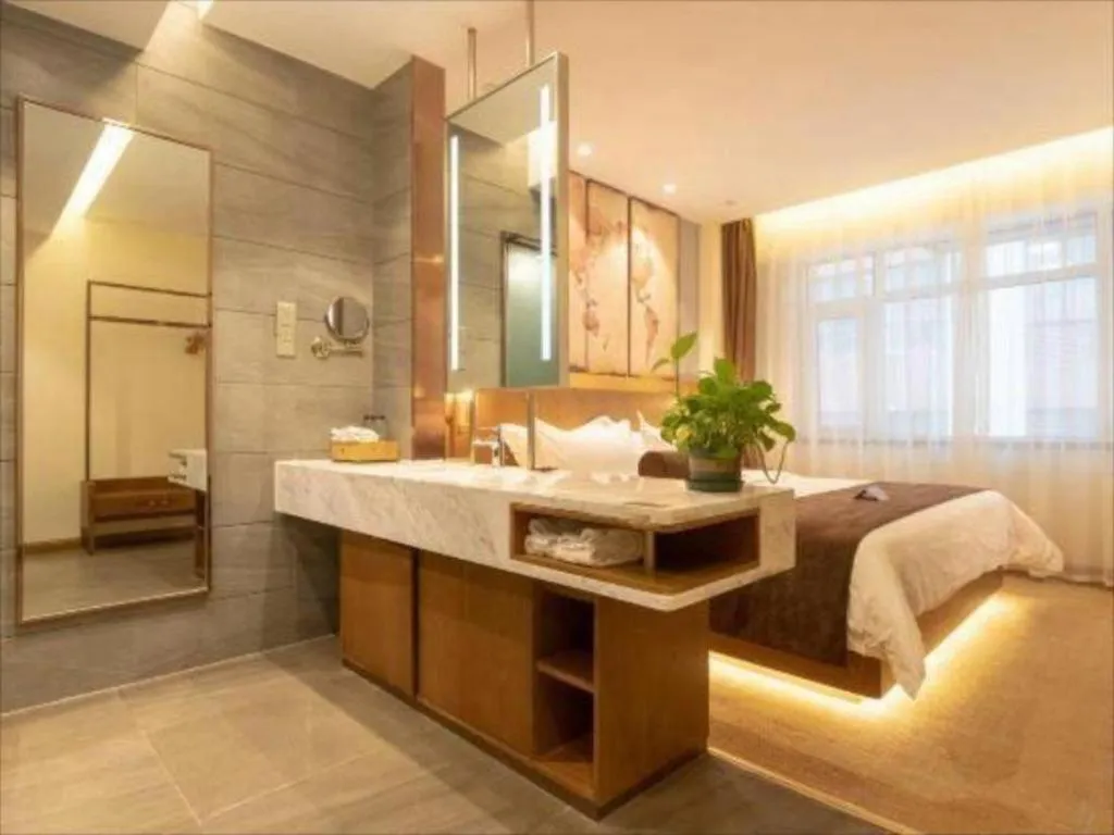 Bed in James Joyce Coffetel Shijiazhuang Century Park Shiji Huamao