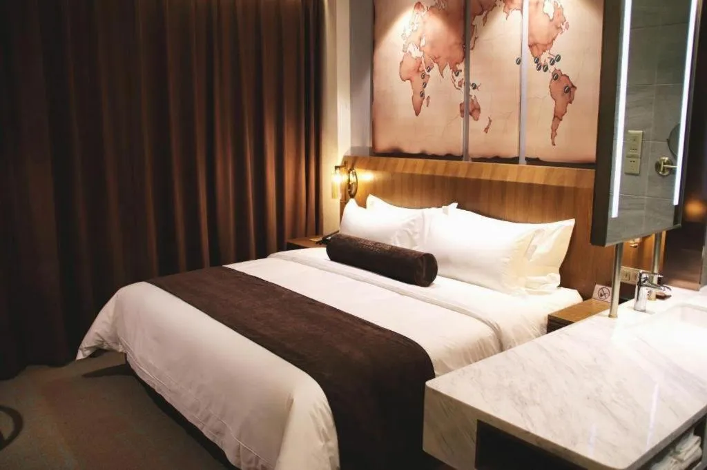 Bed in James Joyce Coffetel Shijiazhuang Century Park Shiji Huamao