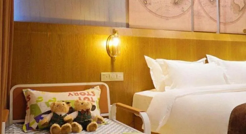 Bed in James Joyce Coffetel Shijiazhuang Century Park Shiji Huamao