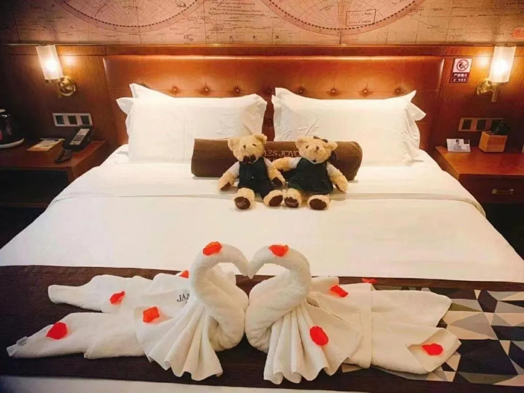 Bed in James Joyce Coffetel Shijiazhuang Century Park Shiji Huamao