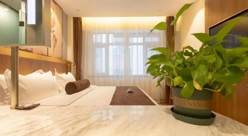 Bed in James Joyce Coffetel Shijiazhuang Century Park Shiji Huamao