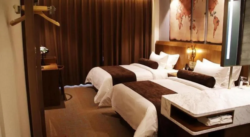 Bed in James Joyce Coffetel Shijiazhuang Century Park Shiji Huamao