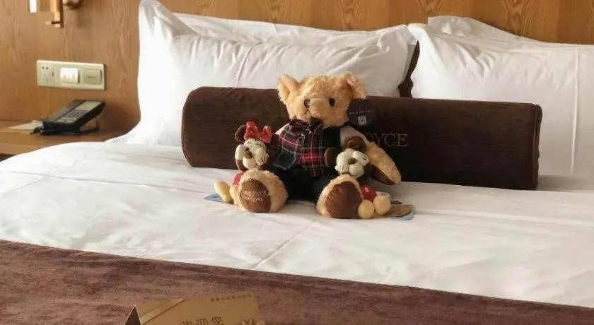 Bed in James Joyce Coffetel Shijiazhuang Century Park Shiji Huamao