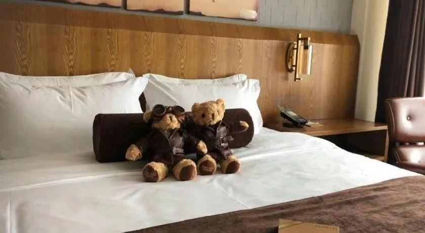 Bed in James Joyce Coffetel Shijiazhuang Century Park Shiji Huamao