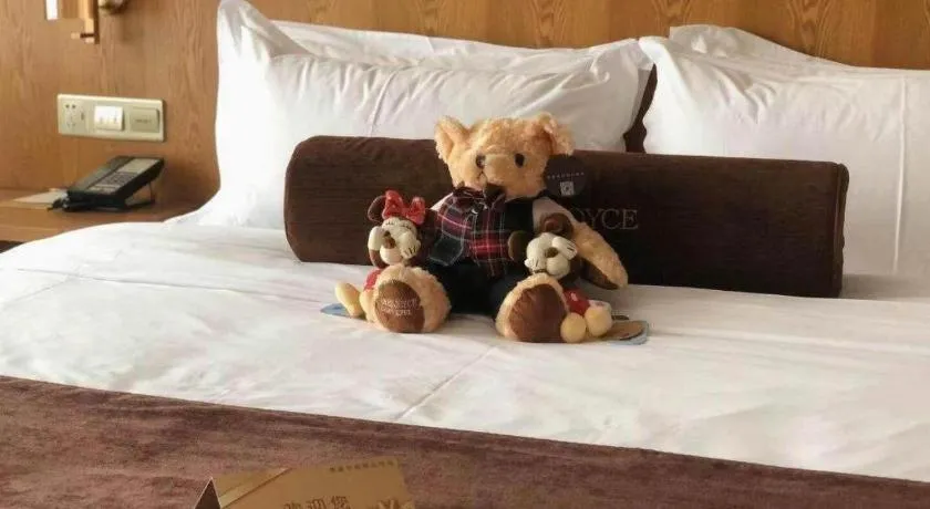 Bed in James Joyce Coffetel Shijiazhuang Century Park Shiji Huamao