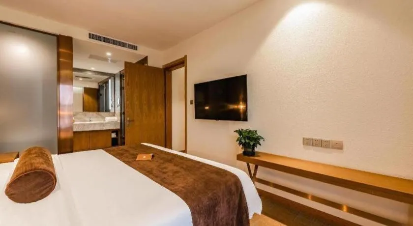 Bed in James Joyce Coffetel Shijiazhuang Century Park Shiji Huamao