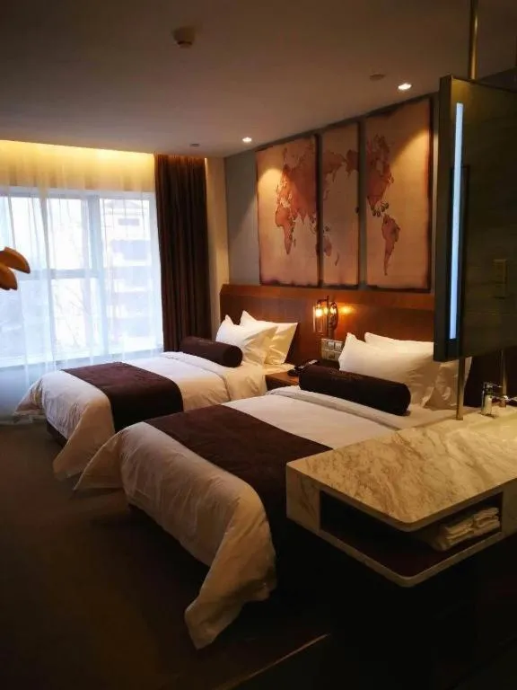 Bed in James Joyce Coffetel Shijiazhuang Century Park Shiji Huamao