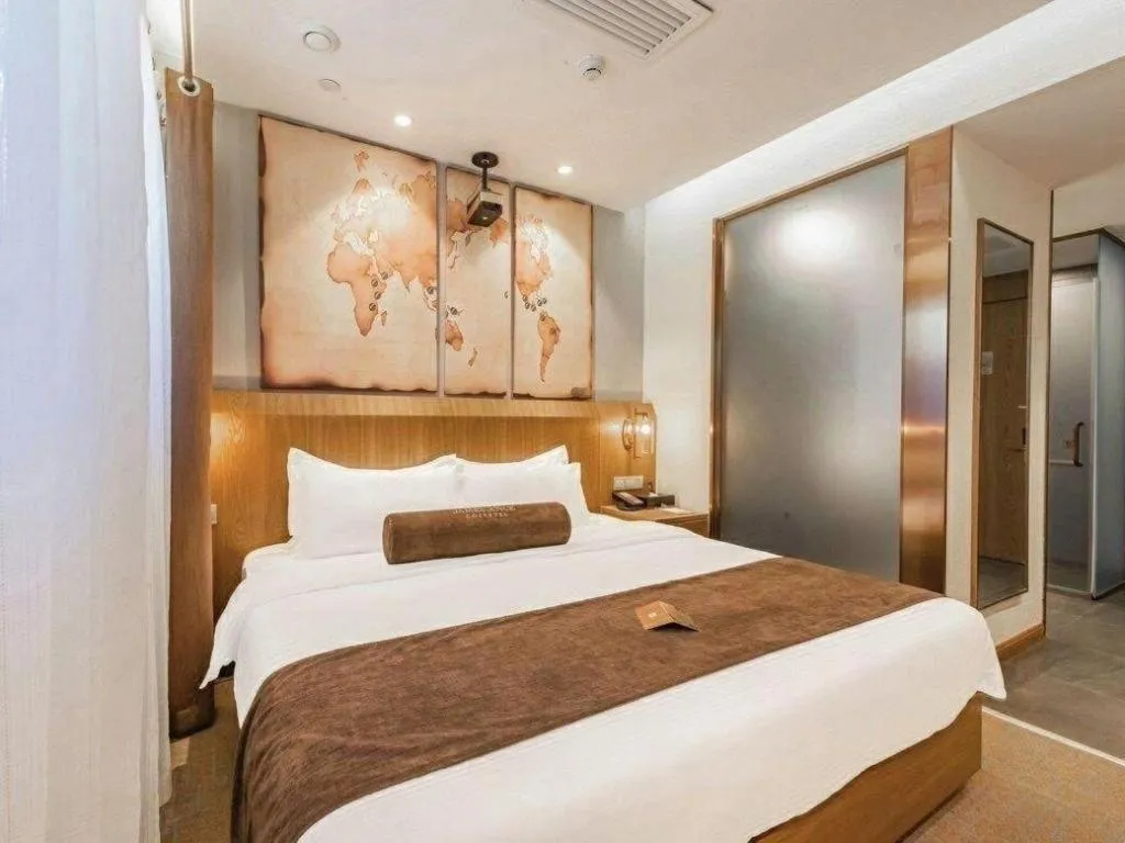 Bed in James Joyce Coffetel Shijiazhuang Century Park Shiji Huamao