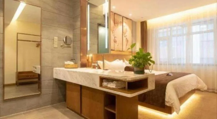 Bed in James Joyce Coffetel Shijiazhuang Century Park Shiji Huamao