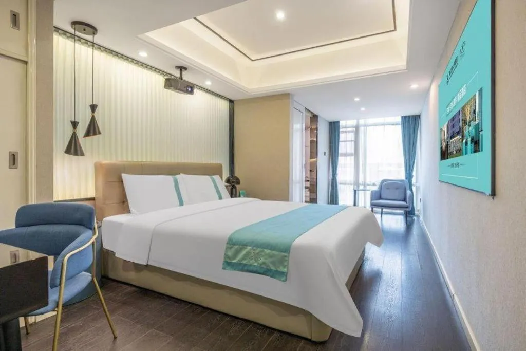 Bed in Xana Hotelle Wuhan Lingjiao Lake Wanda Plaza Branch