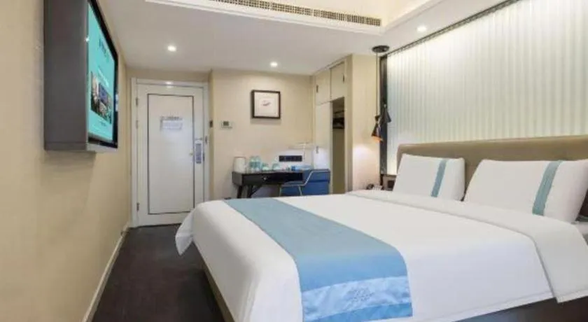 Bed in Xana Hotelle Wuhan Lingjiao Lake Wanda Plaza Branch