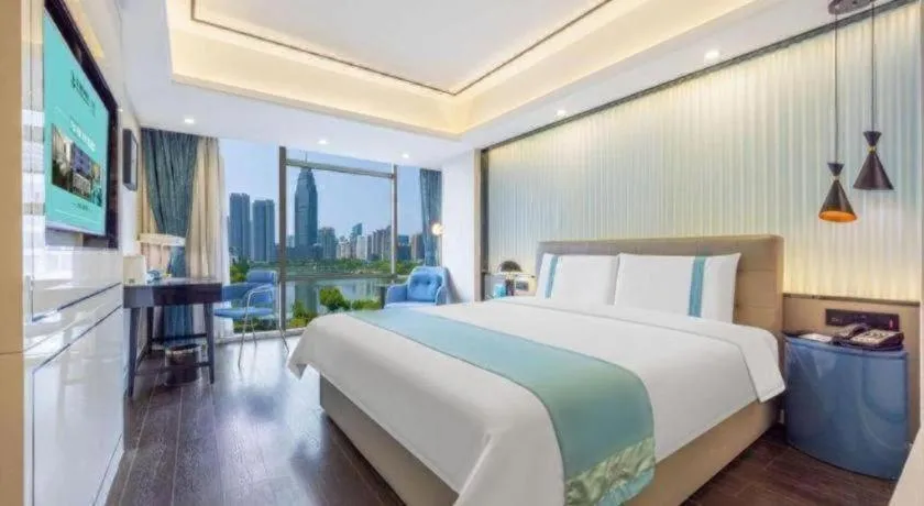 Bed in Xana Hotelle Wuhan Lingjiao Lake Wanda Plaza Branch