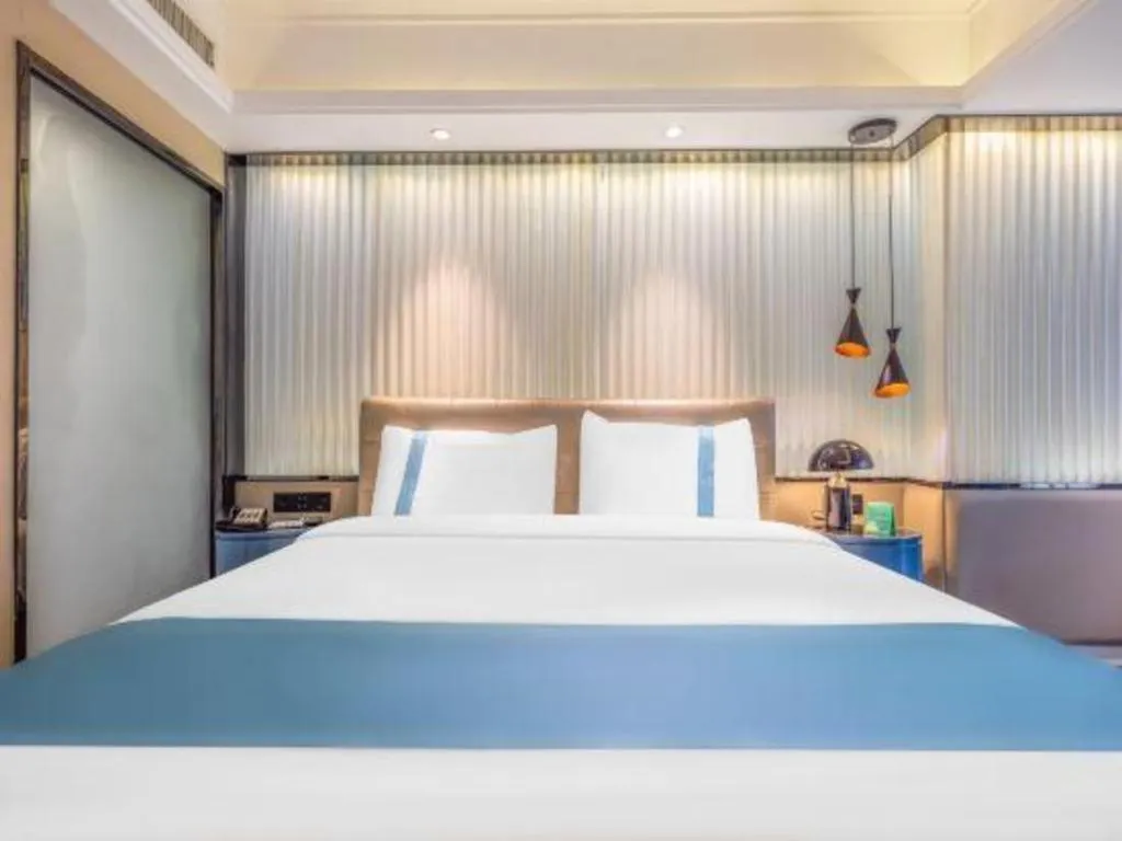 Bed in Xana Hotelle Wuhan Lingjiao Lake Wanda Plaza Branch