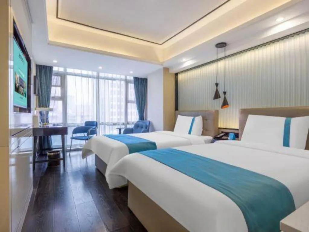 Bed in Xana Hotelle Wuhan Lingjiao Lake Wanda Plaza Branch