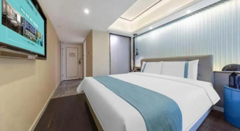 Bed in Xana Hotelle Wuhan Lingjiao Lake Wanda Plaza Branch