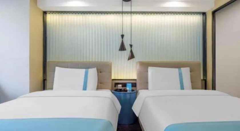 Bed in Xana Hotelle Wuhan Lingjiao Lake Wanda Plaza Branch