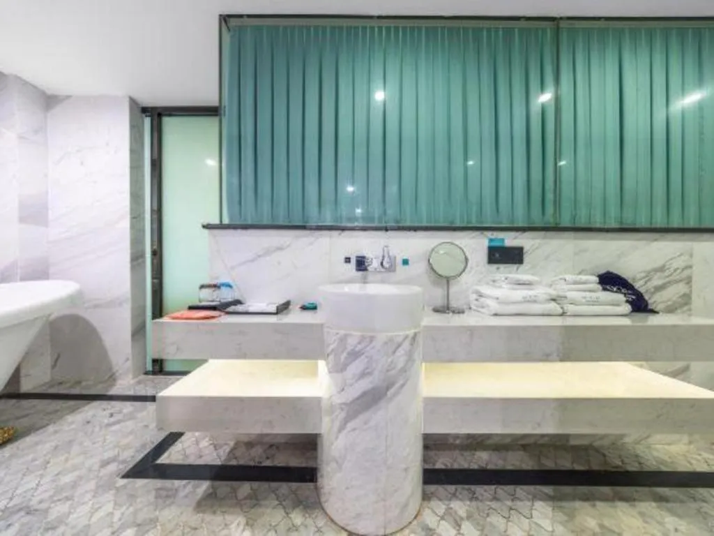 Bed in Xana Hotelle Wuhan Lingjiao Lake Wanda Plaza Branch