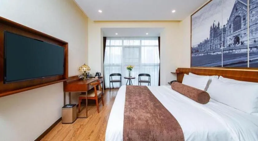 Bed in James Joyce Coffetel Wuhan Huanlegu Renhe Road Subway Station